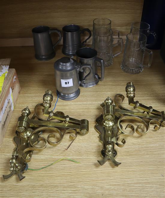 A pair of Victorian brass brackets and assorted tankards